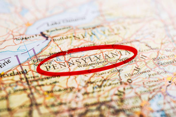 Pennsylvania state circled with red marker on map. Close up shot.